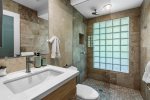 Guest Bath Shared By Guest Bedrooms Features Walk-In Shower